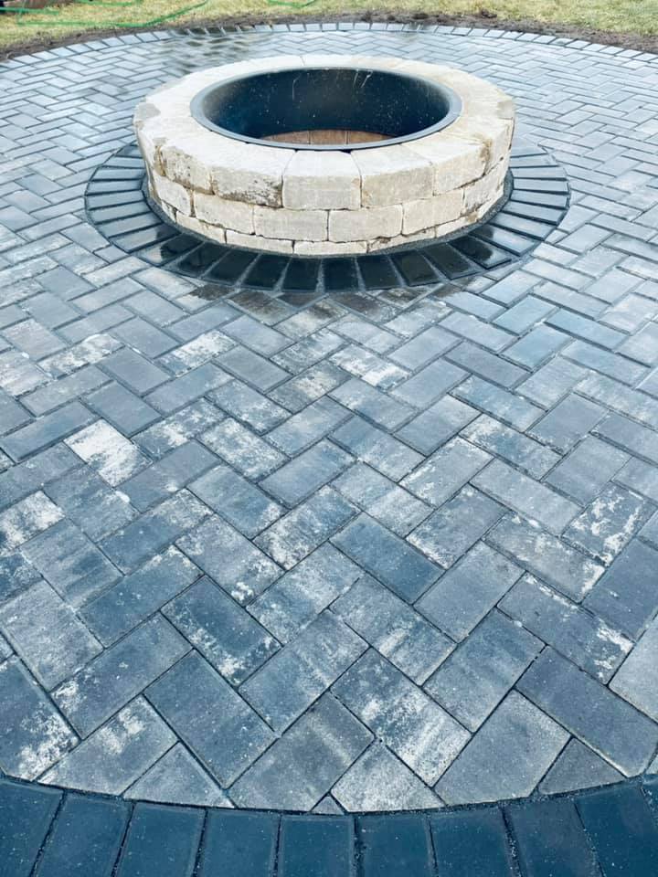 Mid Lakes Outdoor Contracting black paver fire pit project