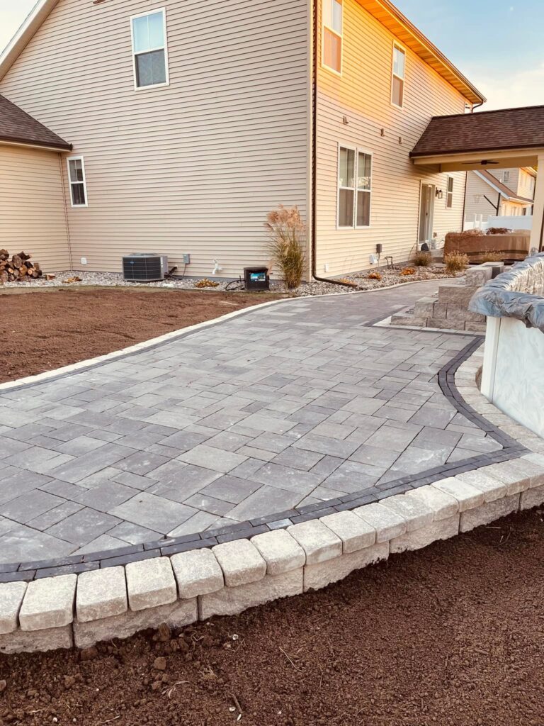 Mid Lakes Outdoor Contracting pool side pave patio project-2