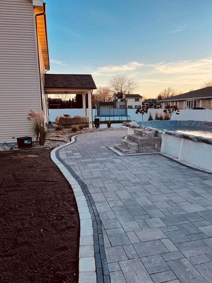 Mid Lakes Outdoor Contracting pool side pave patio project-4